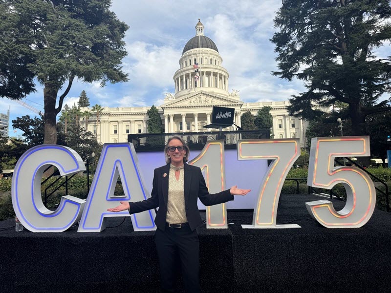 Image of Senator Blakespear posing in front of the state Capitol with the CA 175 sign.
